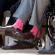 Former president George H.W. Bush sporting a dashing pair of hot pink socks at the dedication of the George W. Bush Presidential Library in 2013.